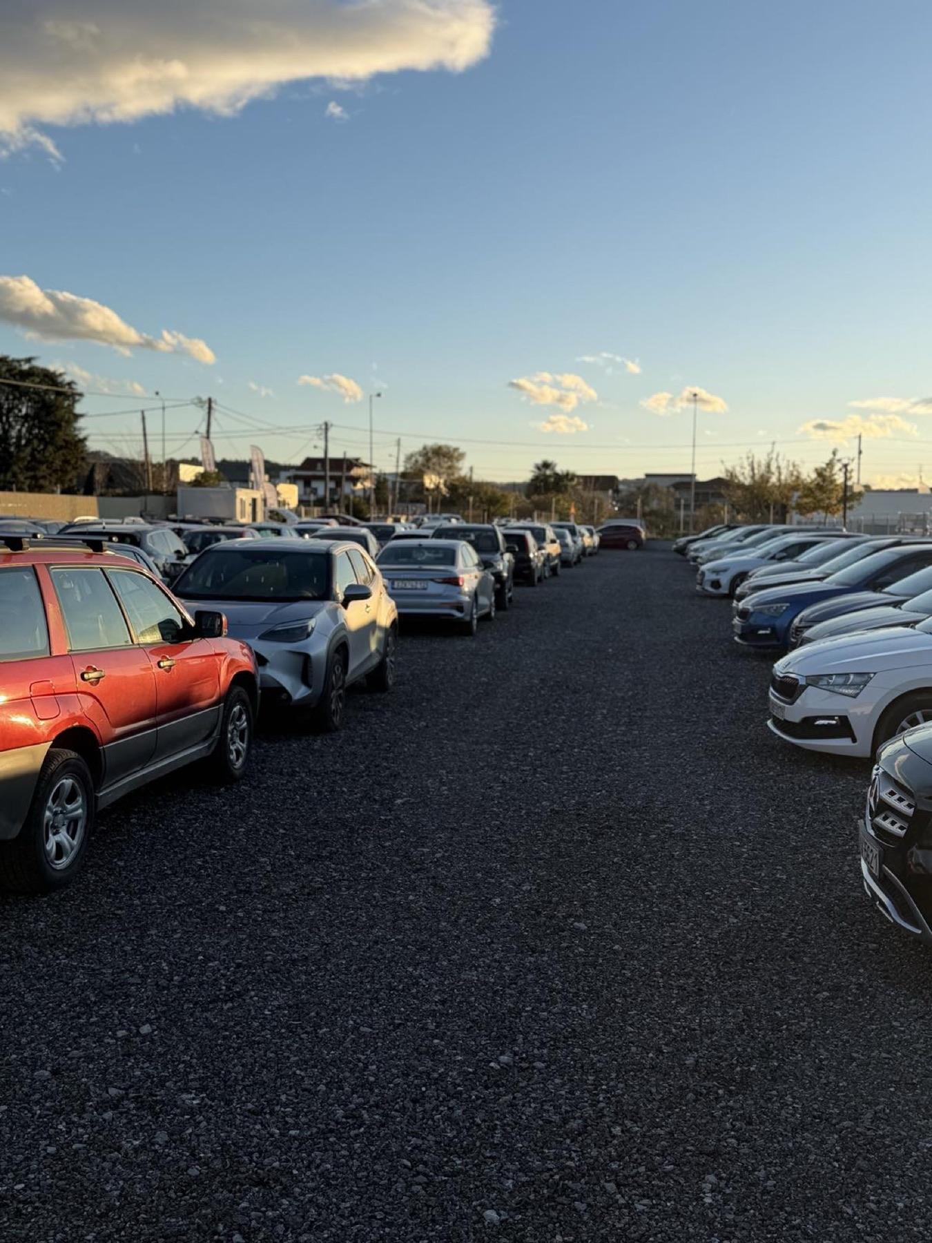 Rows of parked cars at Thess Airpark